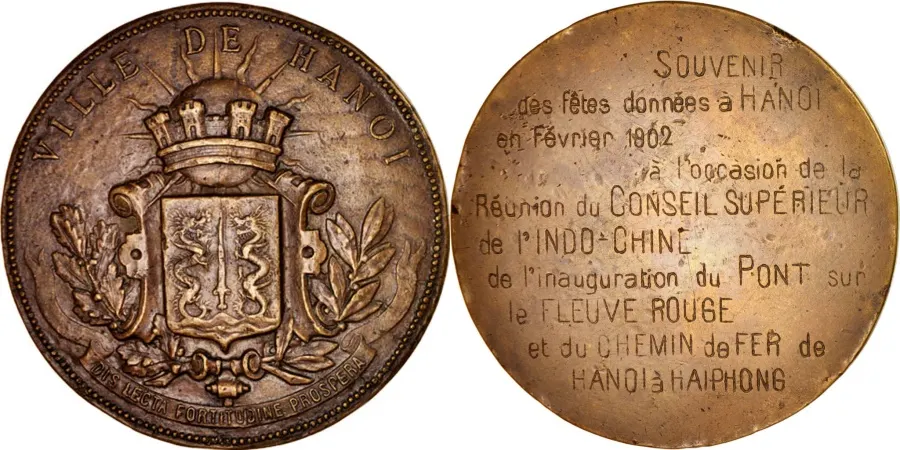 A 1902 token coin medal issued by Hanoi showing its municipal coat of arms.