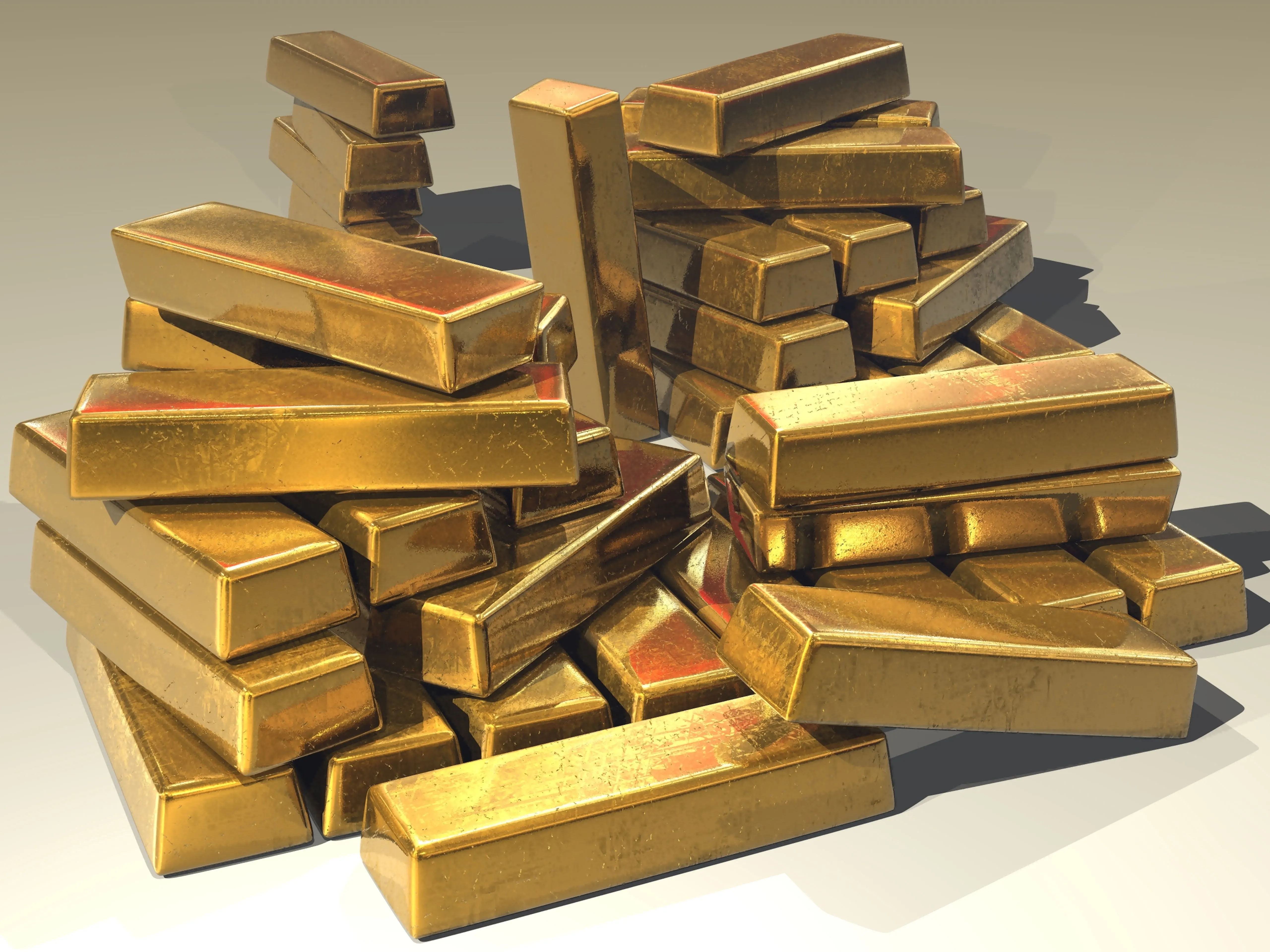 Naskládané zlaté investiční slitky